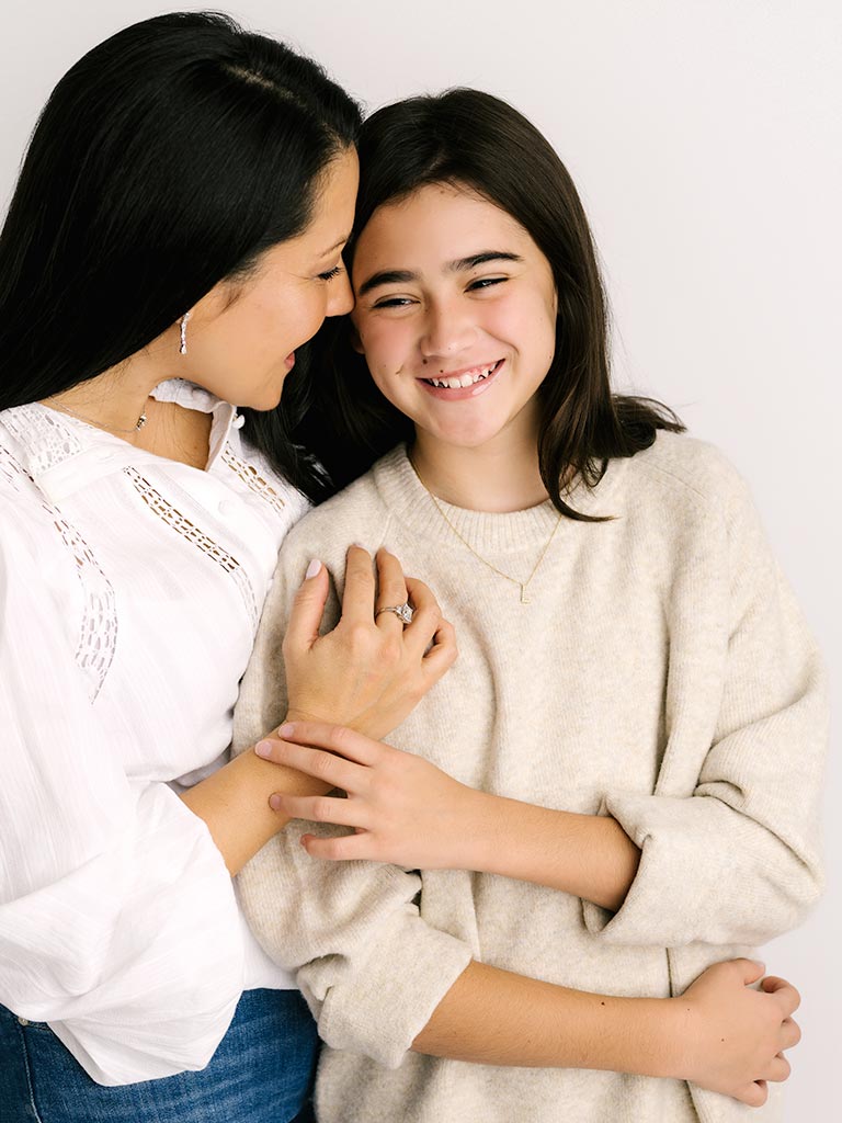 mother-and-daugher-holding-each-other